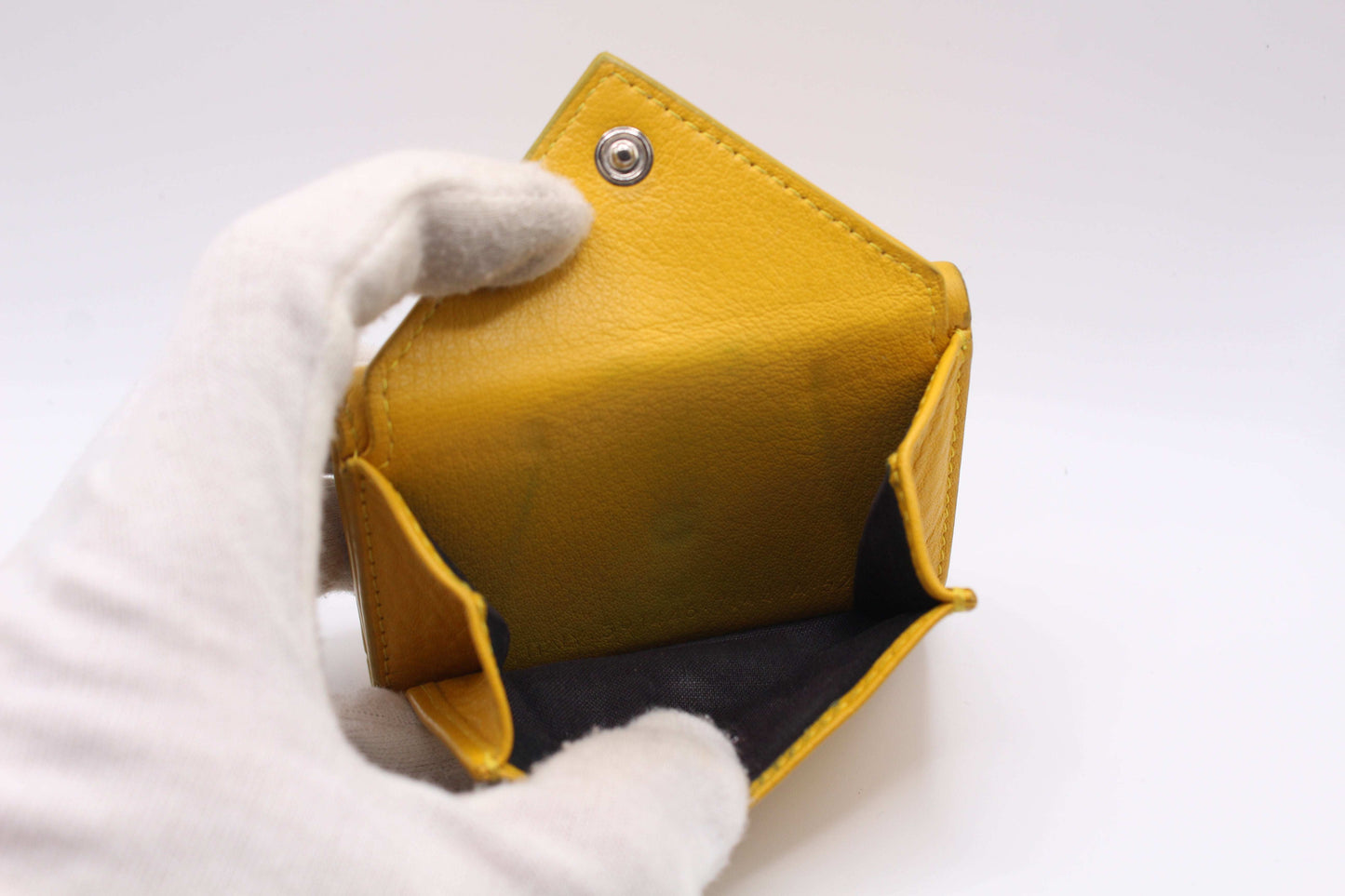 Yellow Balenciaga Portmonee wallet in leather, size 10x7, showing light wear, open view.