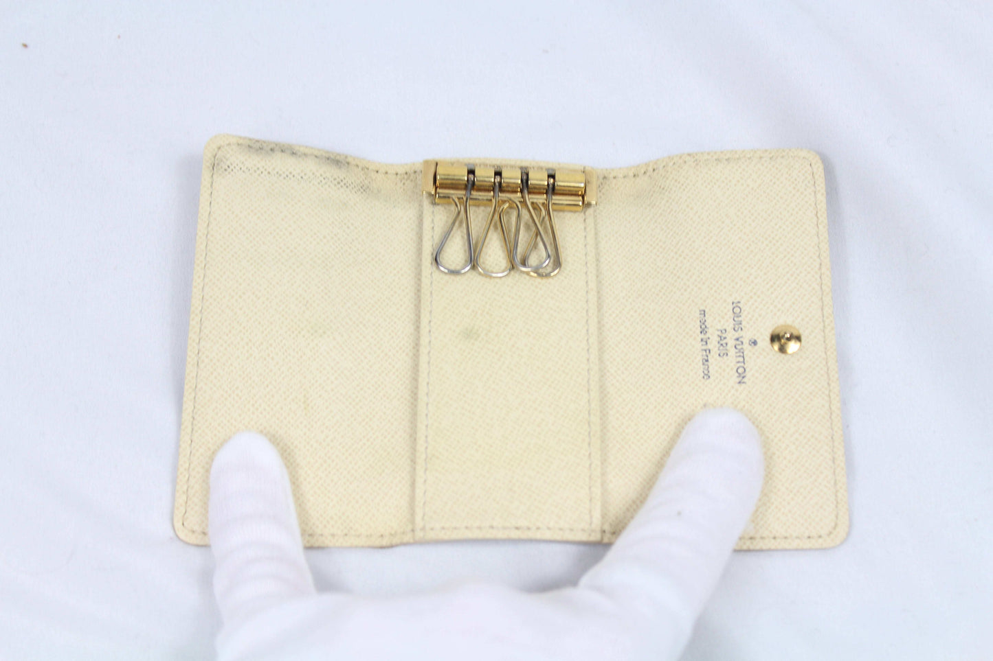 Louis Vuitton Damier Keyholder in brown canvas, 7/10 condition.