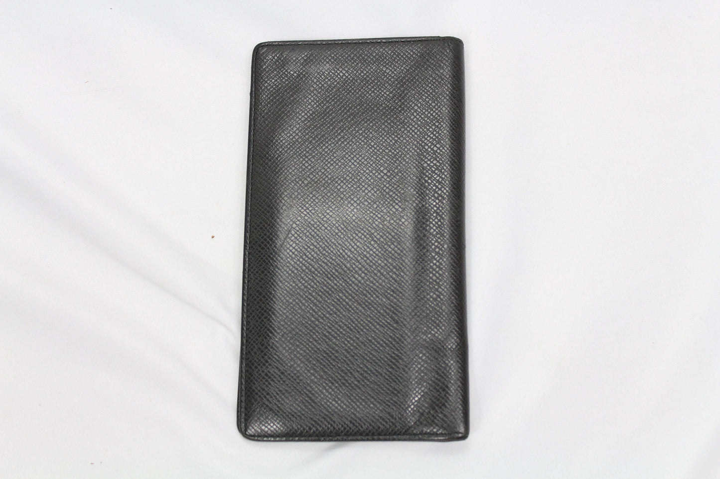 Louis Vuitton Taiga Portmonee in good condition, size 20x12cm.