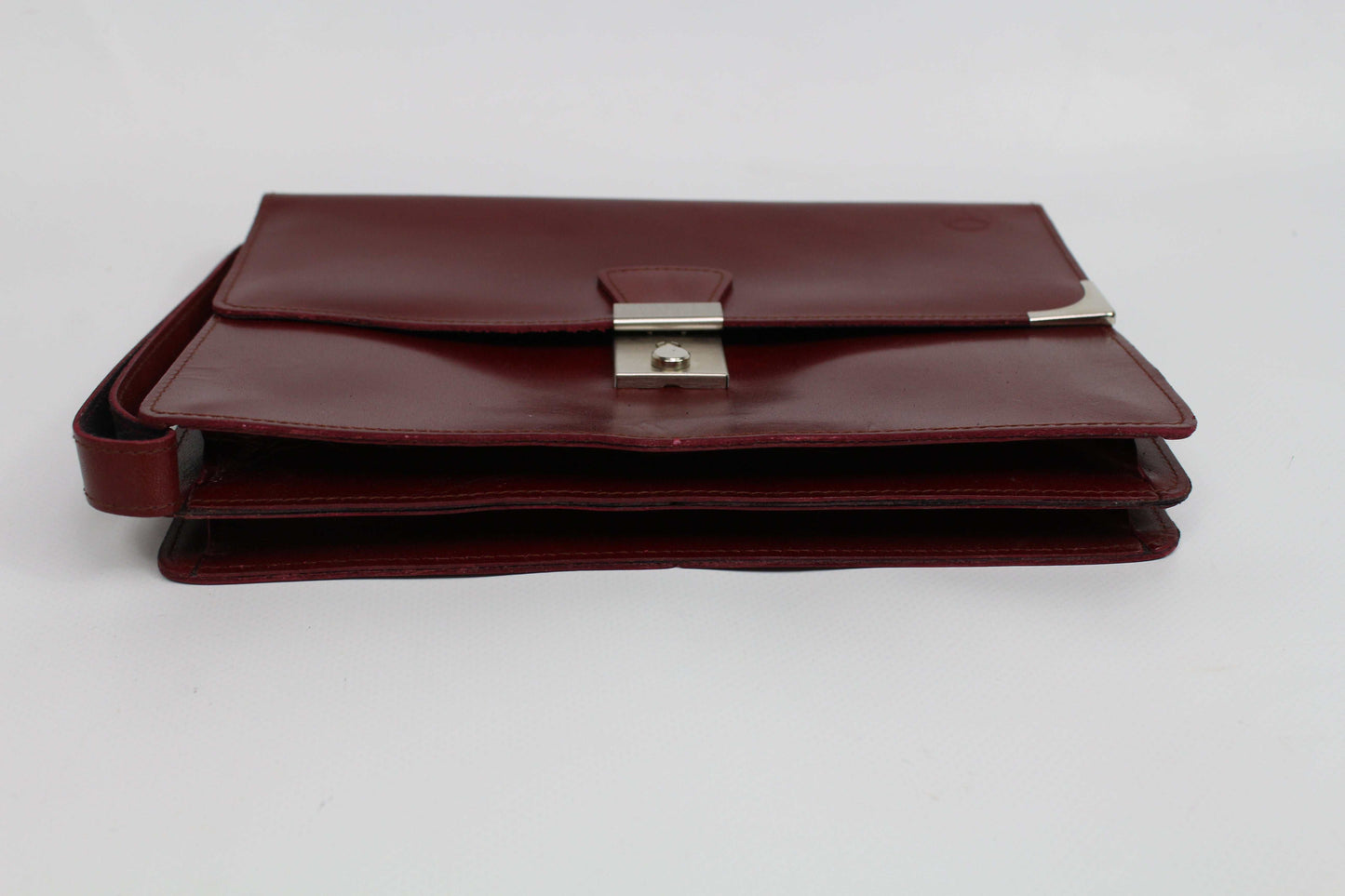 Vintage Mercedes Clutch Bordeaux, burgundy leather, slight wear, 8/10 condition.