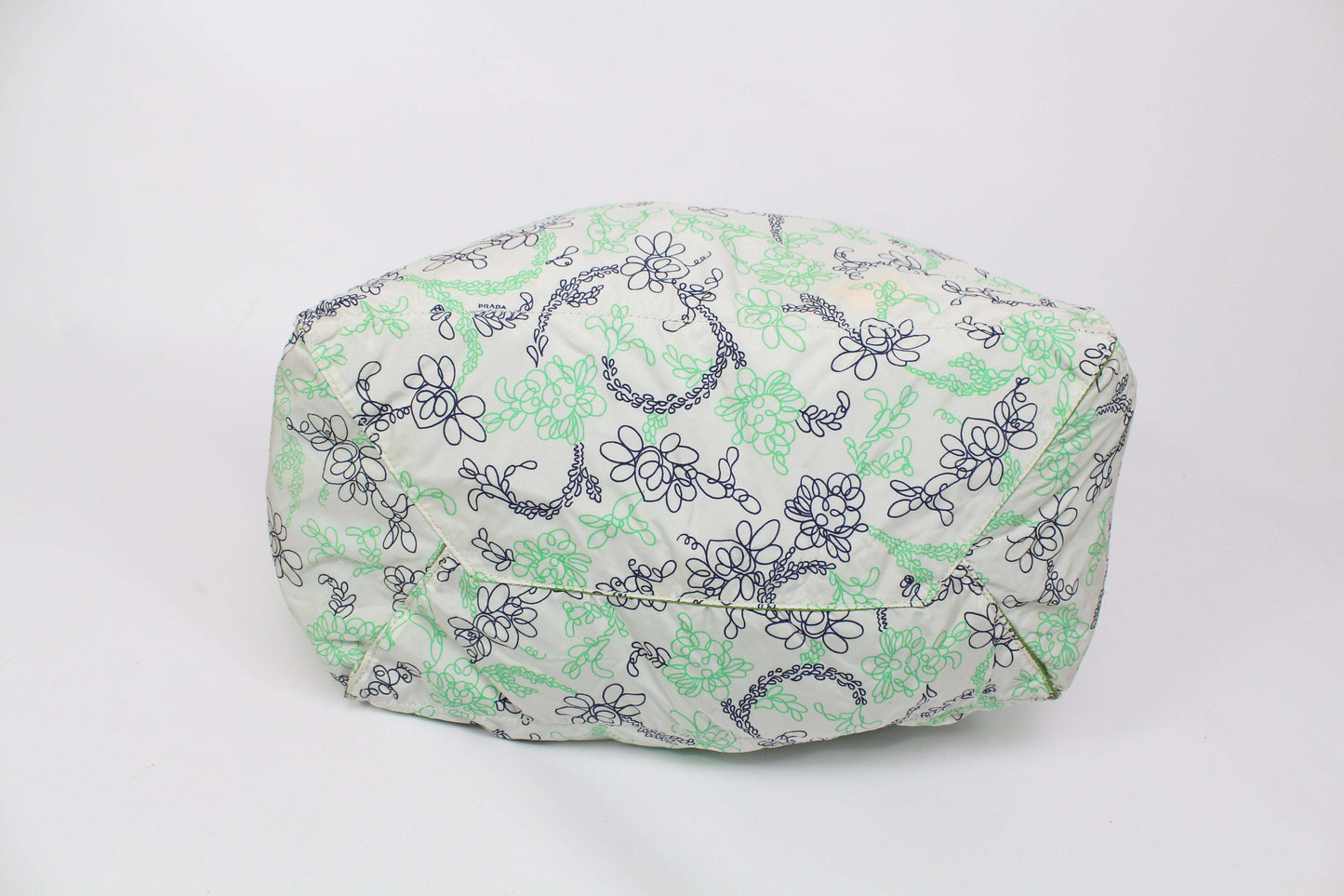 PRADA Shopper Green/White with floral design, nylon material, showing wear.