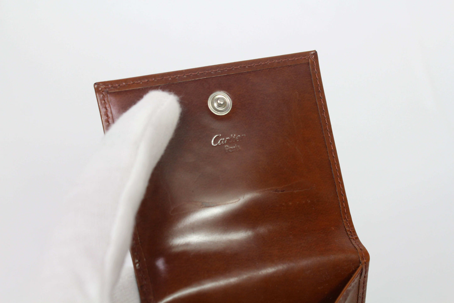 Cartier Portmonee Orange leather wallet with box, 8x8cm, dark orange color, 7/10 condition, slight signs of use.