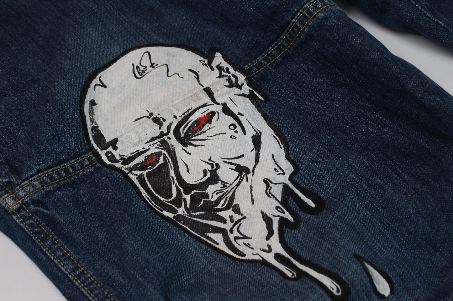Custom painted G-Star blue jeans with unique artwork, size 32x32, straight fit.
