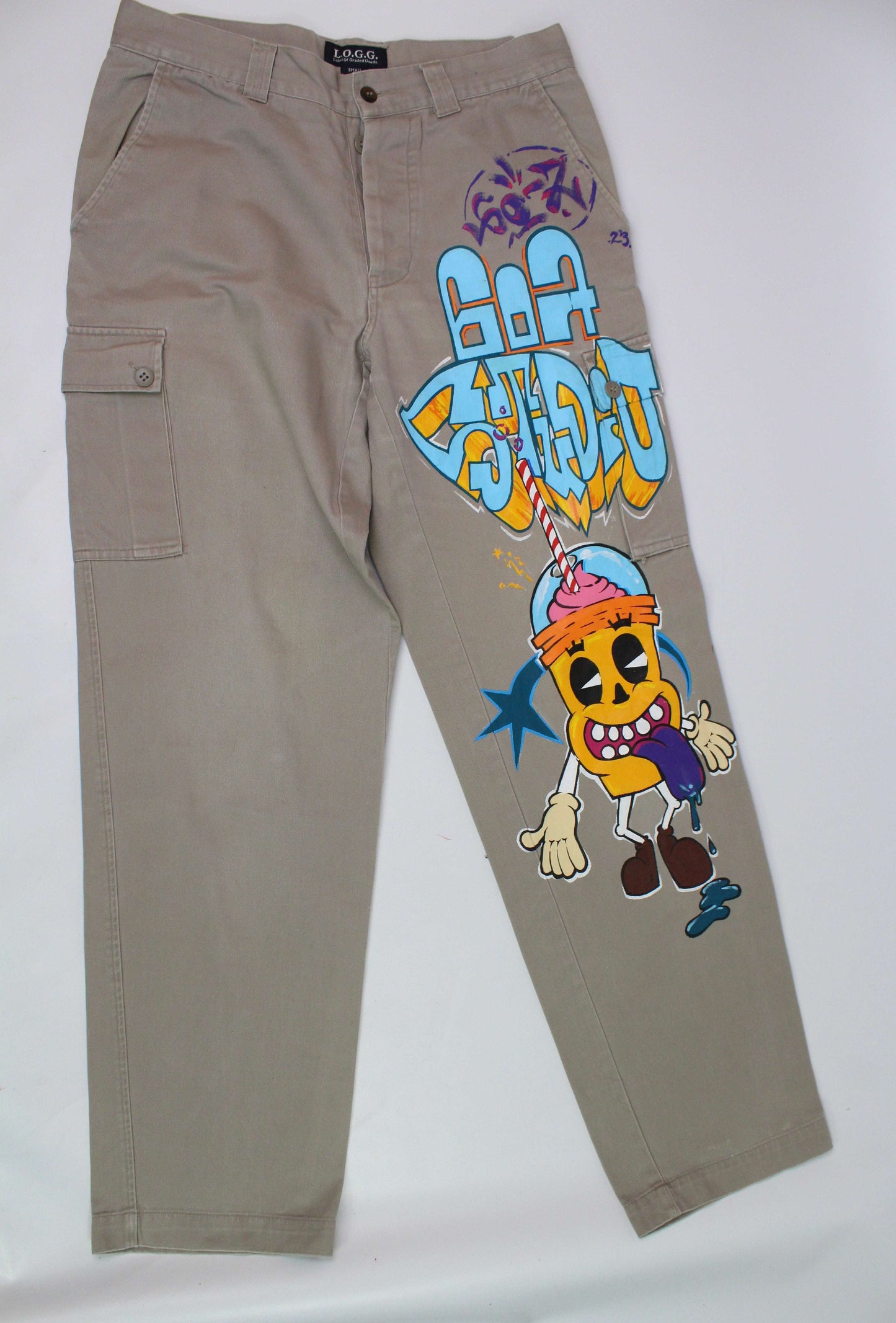 Custom painted beige jeans with colorful graffiti design, size small, straight fit.