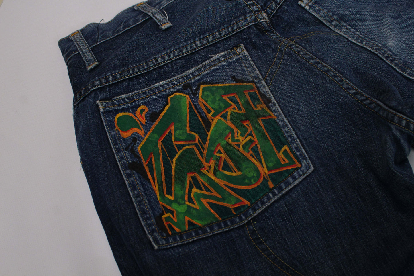 Custom Painted Jeans 1/1 G-Star in blue with unique graffiti design on back pocket, size 32x32, straight fit, cotton material.