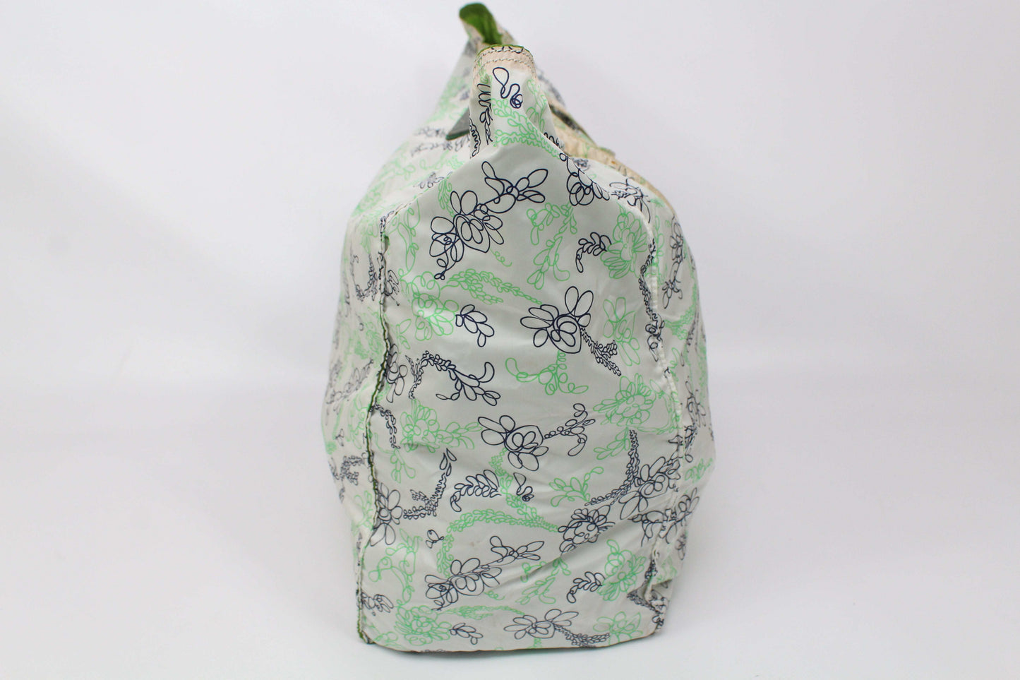 PRADA Shopper Green/White with floral pattern, nylon material, side view.