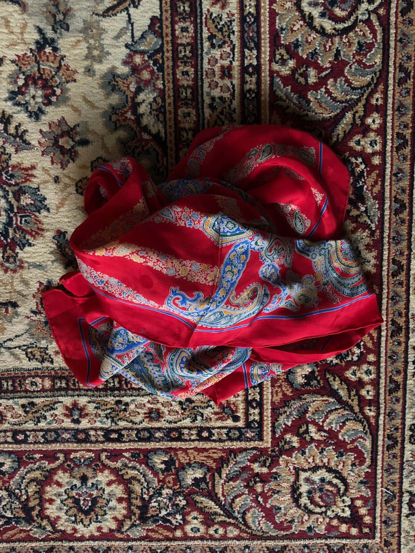 Yves Saint Laurent Bandana in excellent condition on patterned carpet.