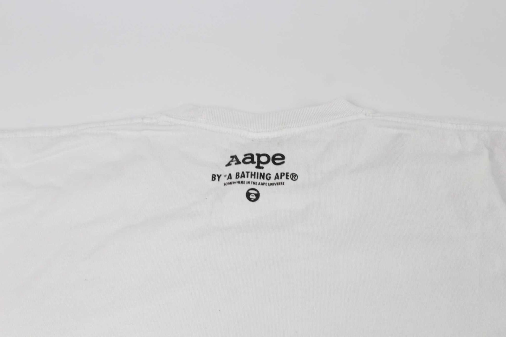 BAPE AAPE Laser Foil Camo Stencil Face TeeBAPE AAPE Laser Foil Camo Stencil Face Tee | LAYZSSHOP | Bape 