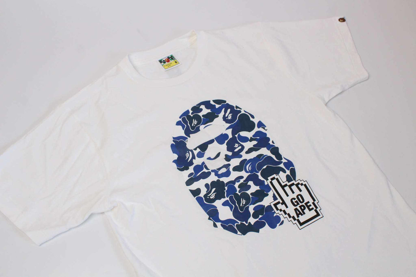 BATHING APE Bape Shirt Blue Camo in white with blue camo design, size M, 100% cotton.