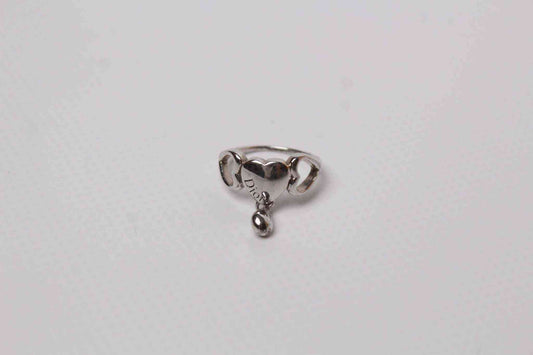 Silver DIOR Heart Ring with dangling charm, size S, in 8/10 condition.