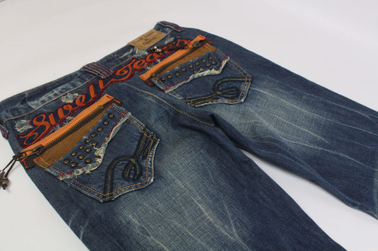 SWELL JEANS embroidery flared denim in blue and orange with decorative back pockets.