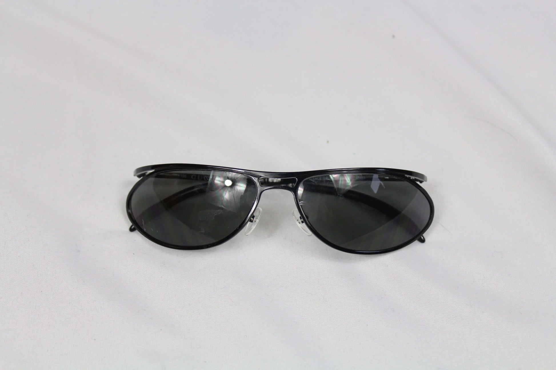 Gucci shades in black with slight wear, includes case.