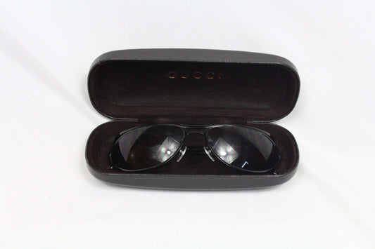 Gucci Shades Black in case showing onesize sunglasses with minor wear.