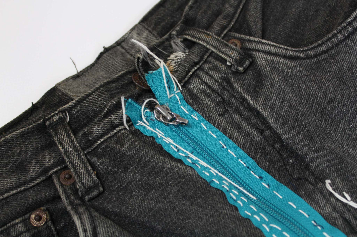 Costarica&Jeans Patchwork Denim with unique blue zipper detail and slim fit design.