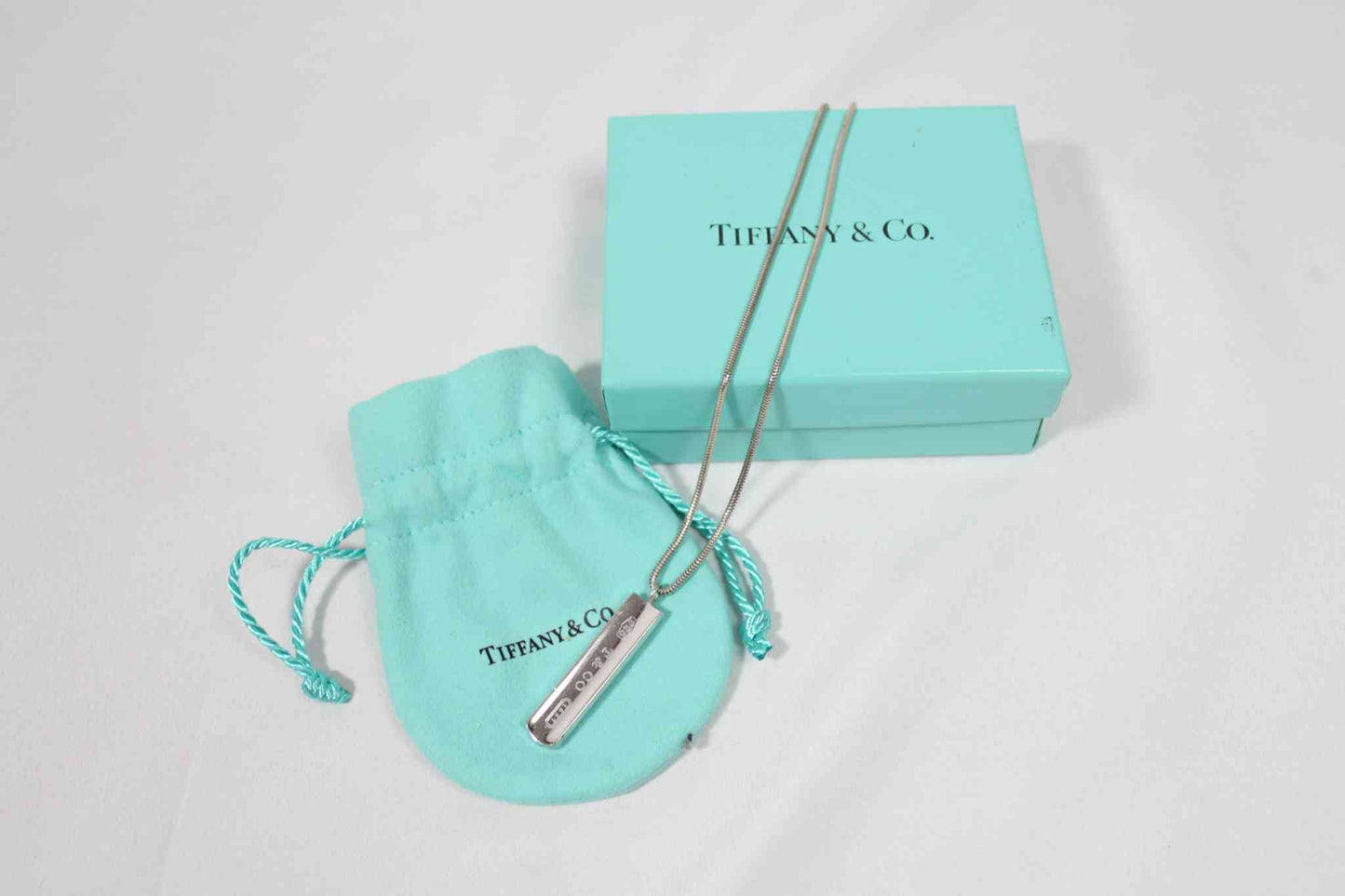 Tiffany & Co Ingot necklace and pendant with box and pouch, size 47cm, in very good condition.