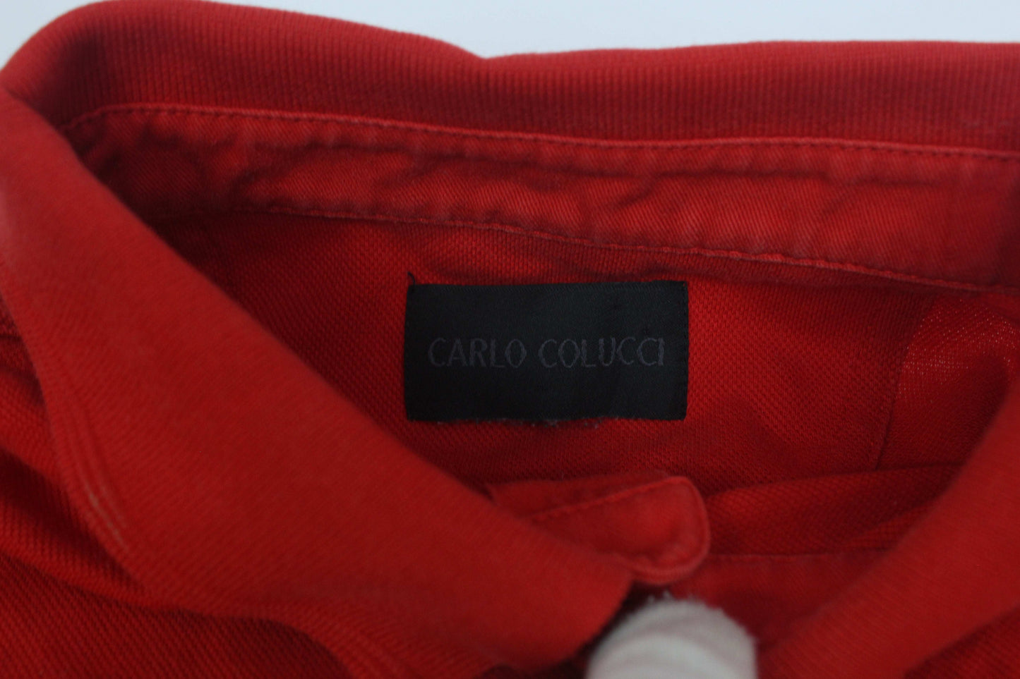 Carlo Colucci red shirt, close-up of collar and label.