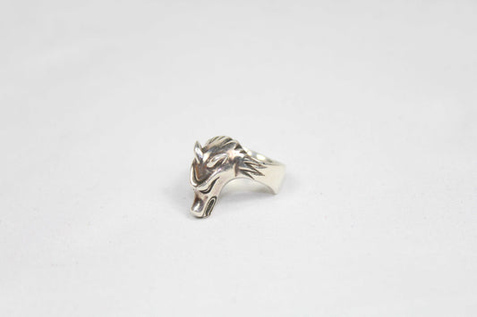 Silver ring with wolf design, size 16mm, in good condition.