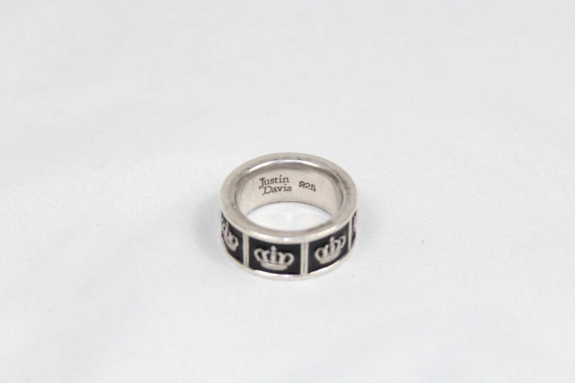 Justin Davis Silver Ring Black 925 SV with crown design and slight scratches, size 19mm.