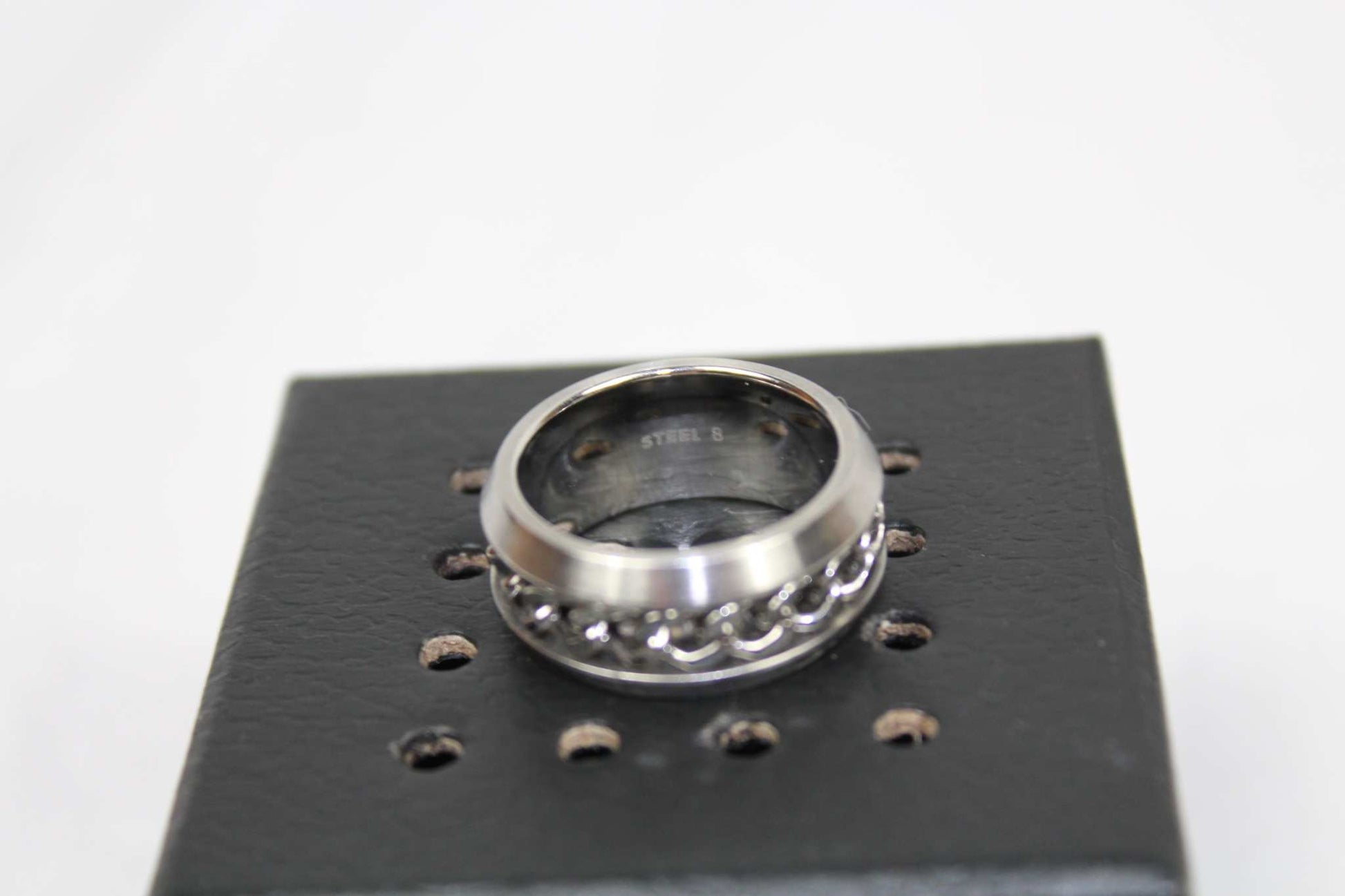 Diesel Ring size 8, like new condition, displayed on a black surface.