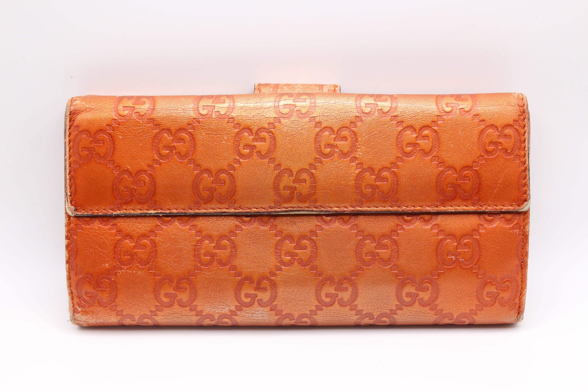 GUCCI Longwallet Orange made of leather with embossed GG pattern, size 20x10 cm.