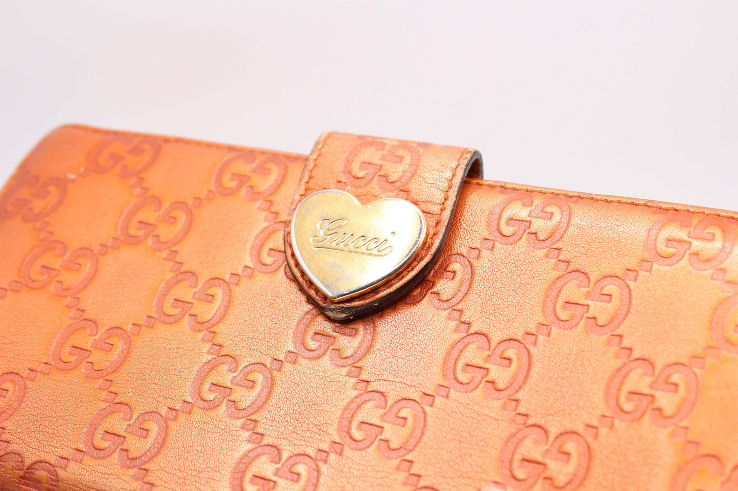 GUCCI Longwallet Orange, leather, 20x10 cm, with button flaw, embossed logo.