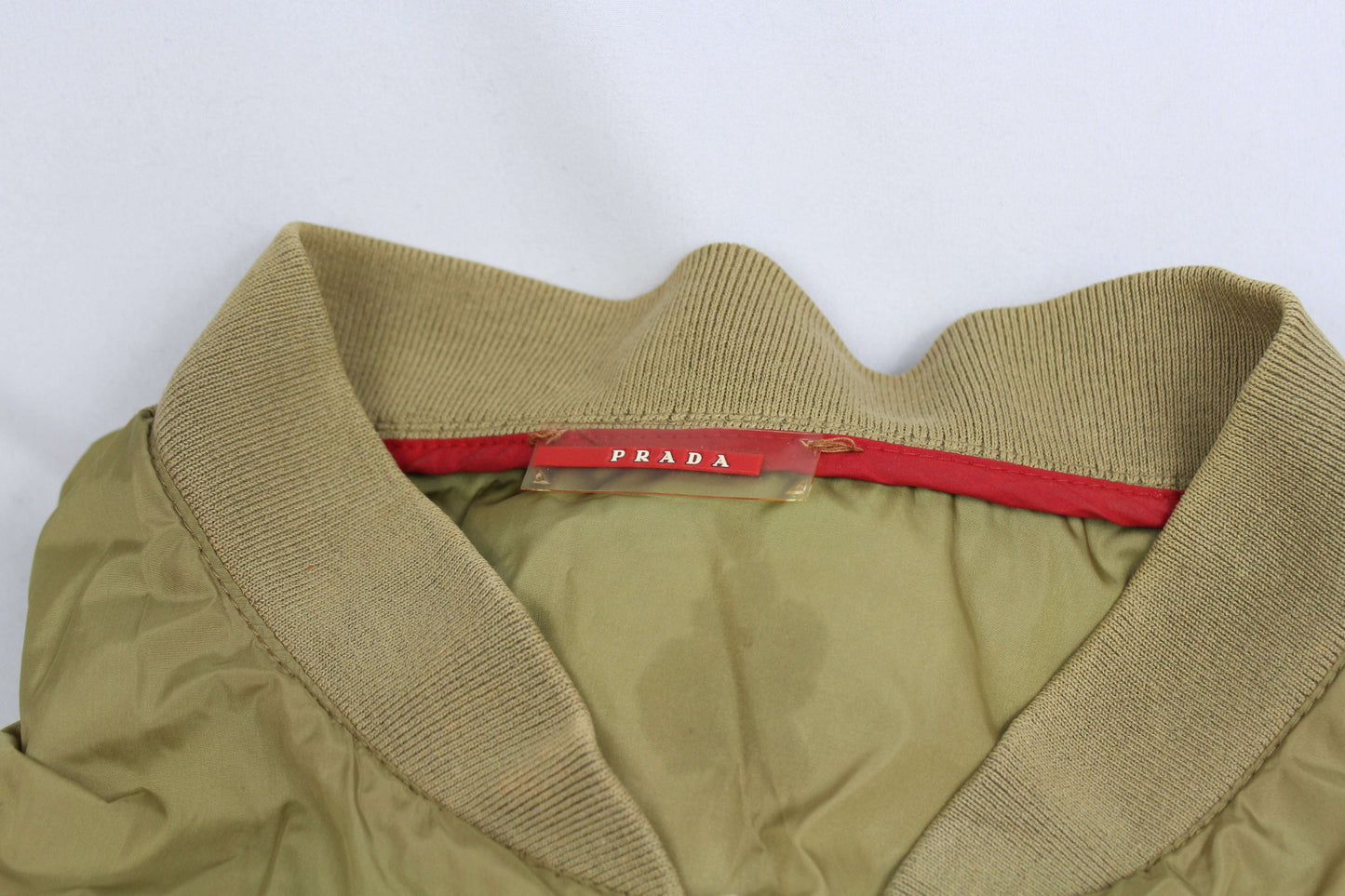 Prada Windbreaker, size S-M, 100% nylon, good condition with minor flaw.