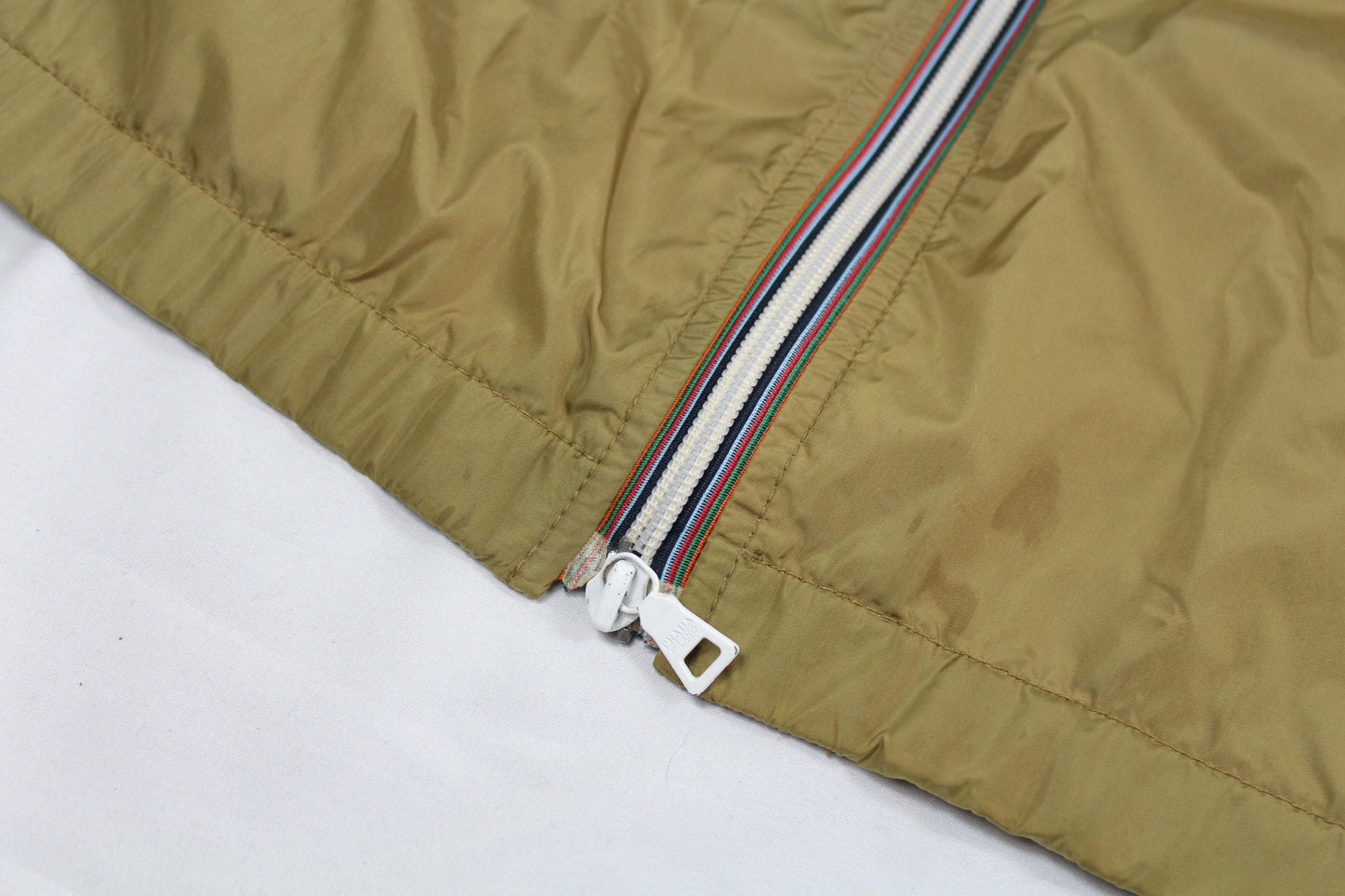 Prada Windbreaker, nylon fabric, zipper detail, tan color.