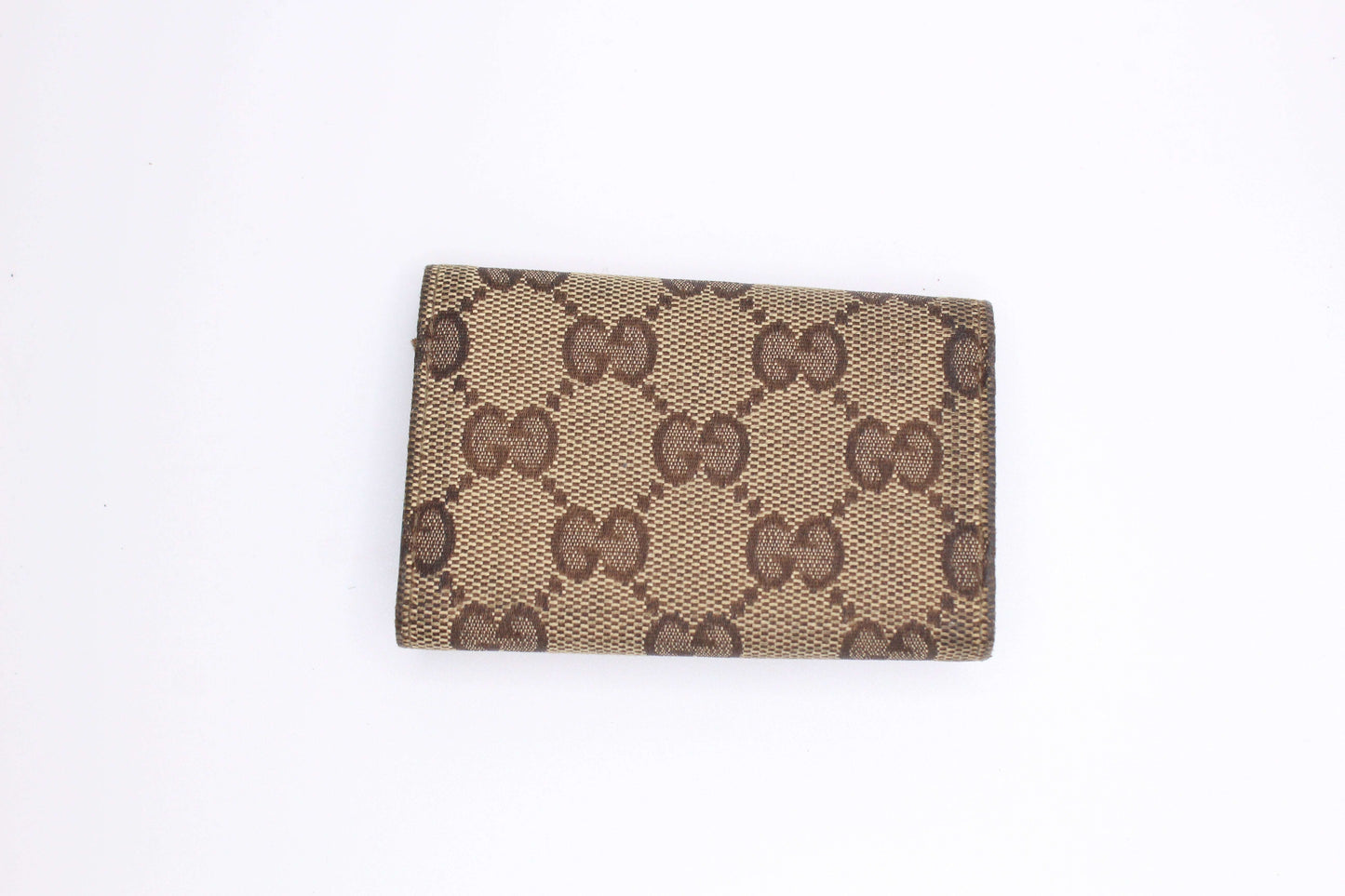 GUCCI Keyholder Monogram Turquoise, brown canvas and leather, size 5x8cm, 8/10 condition.