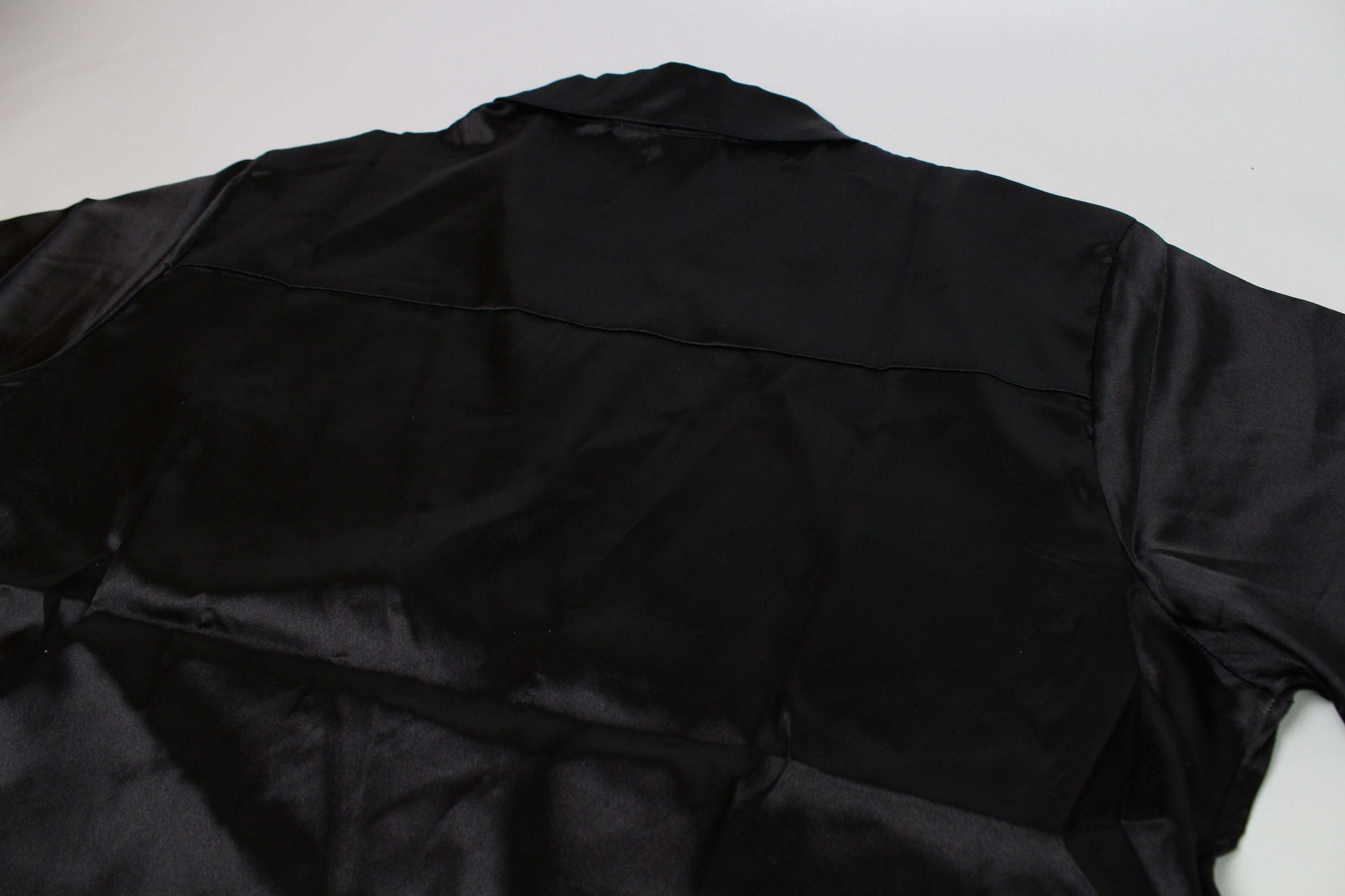 Black ROUGH satin shirt, oversized fit, new condition.