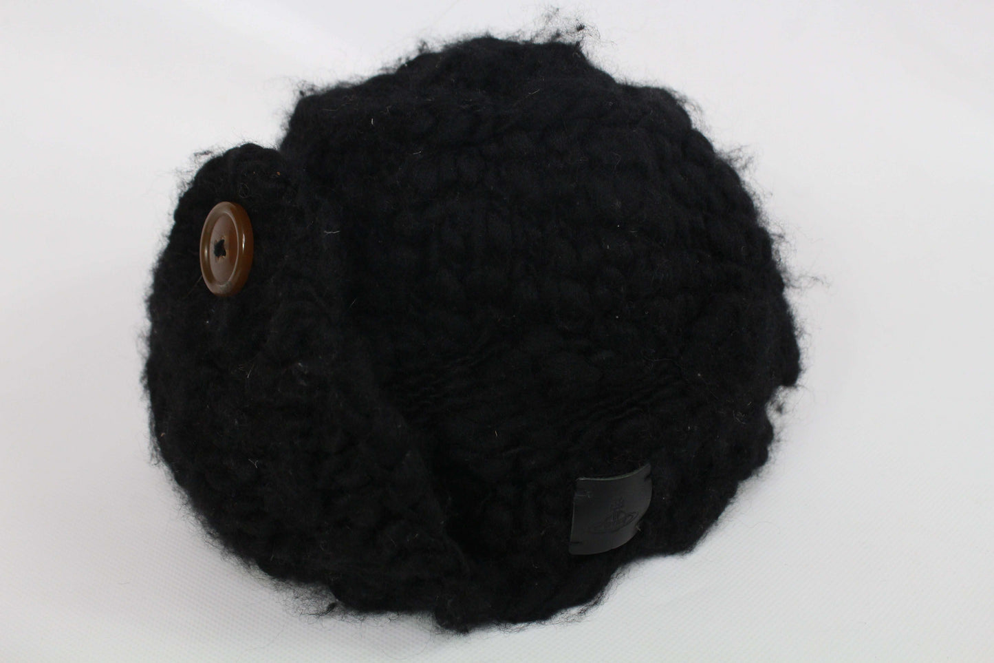 VIVIENNE WESTWOOD black knit wool hat with button detail.