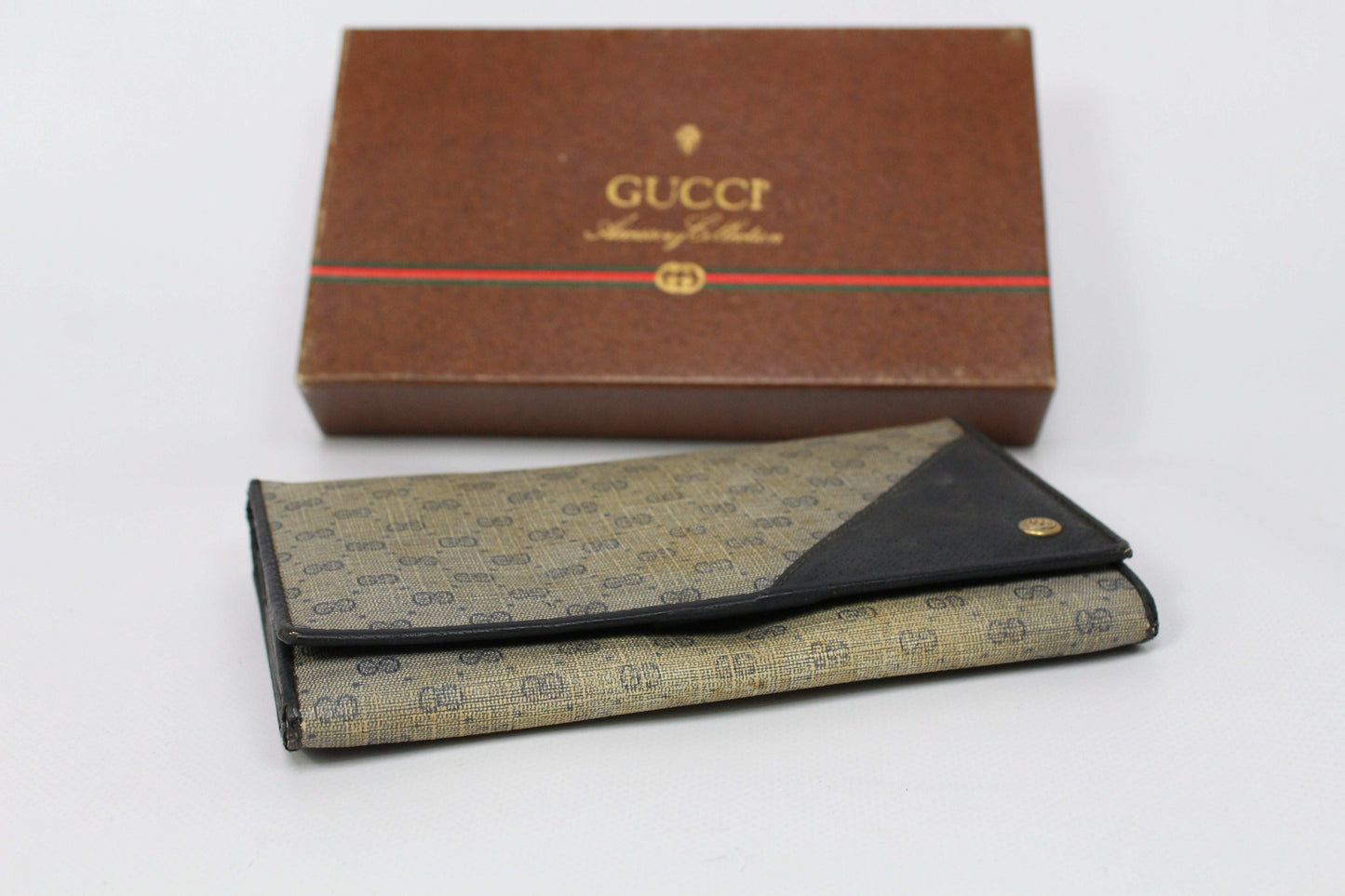 Beige and brown GUCCI long wallet with box, canvas and leather material.