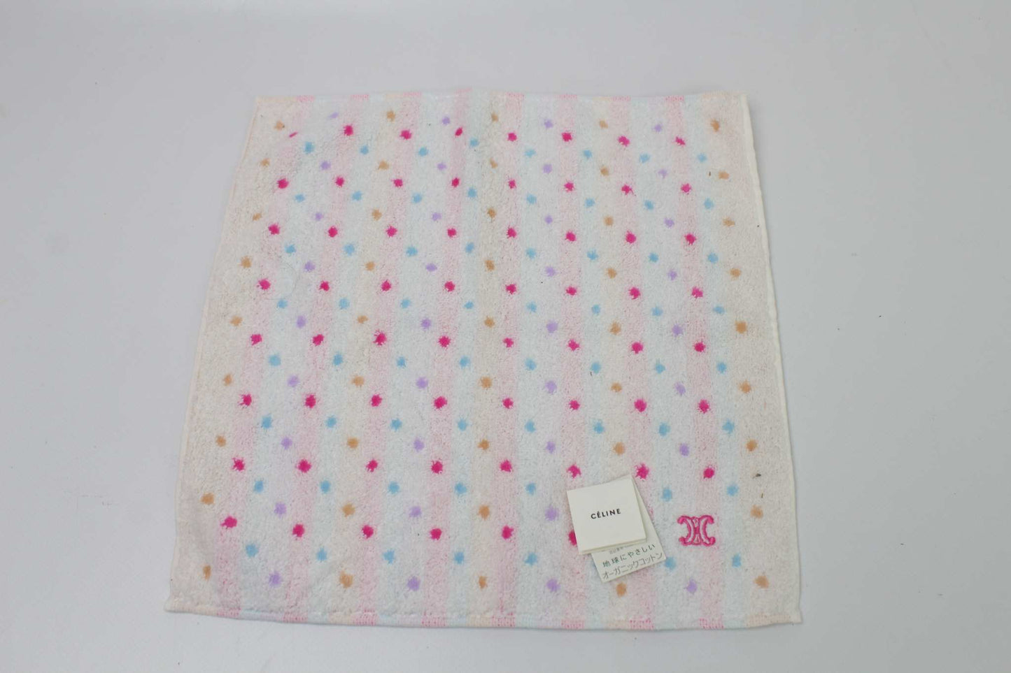 Colorful CELINE scarf with a dotted pattern, size 25x25 cm, displayed on a flat surface.