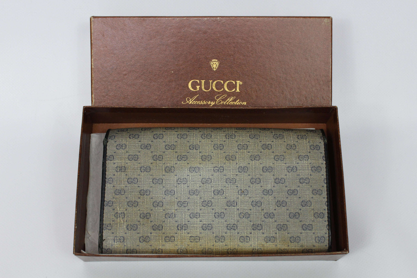 GUCCI Long Wallet in beige/brown canvas and leather in original box.