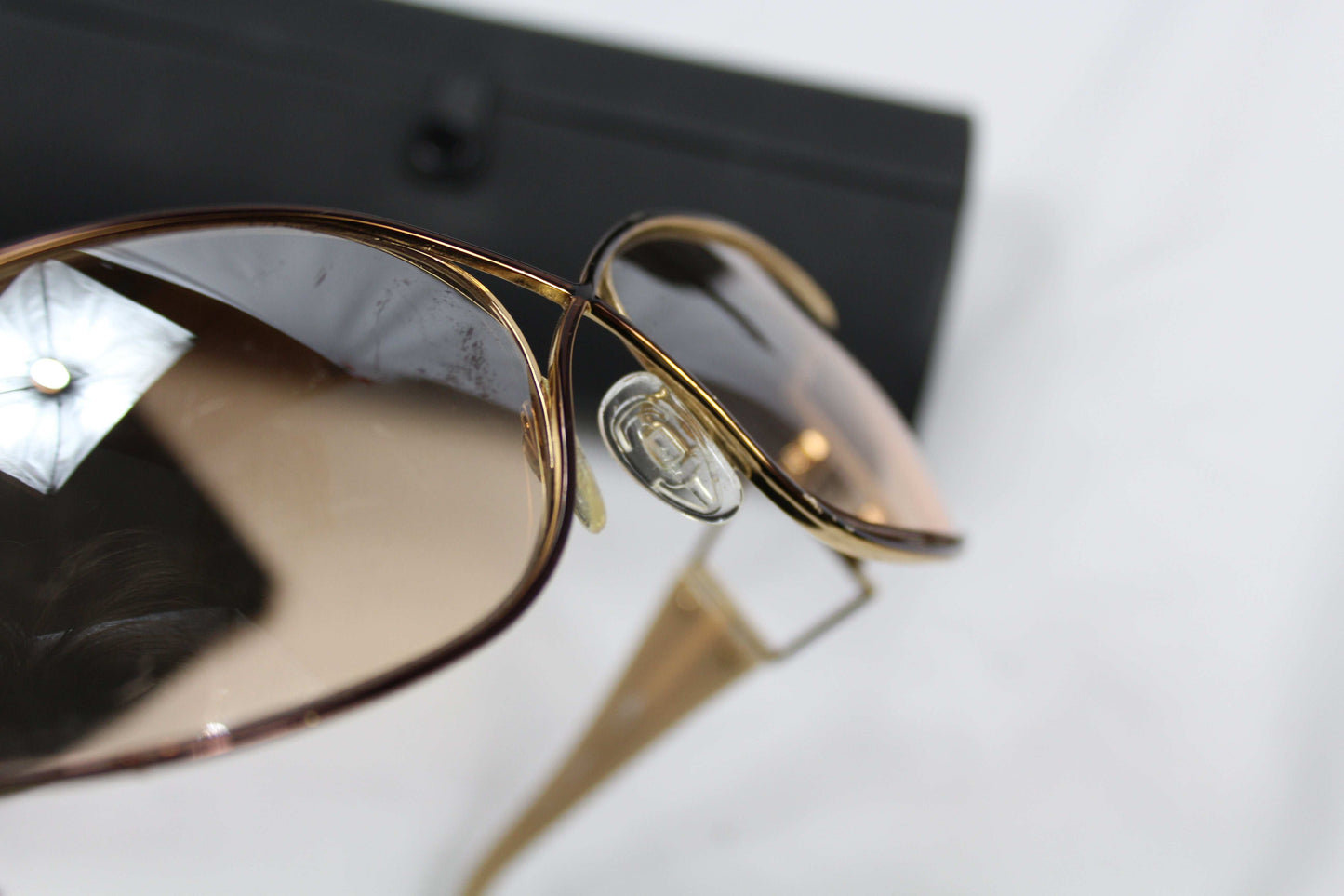 Cazal Shades with slight scratches on lenses, gold-tone frame, includes case.