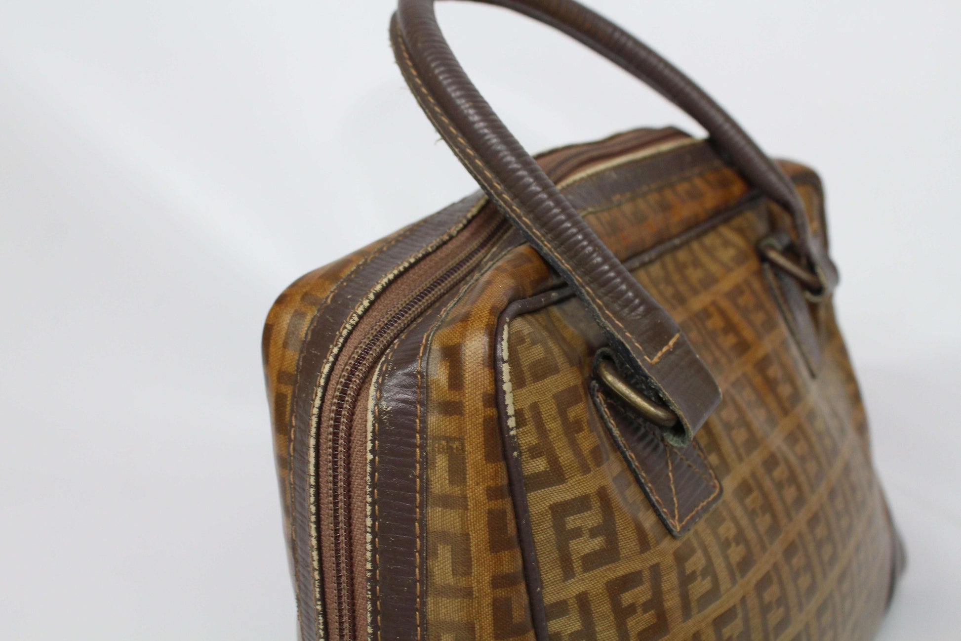 FENDI Bowlingbag Monogram in brown canvas with Fendi logo pattern.