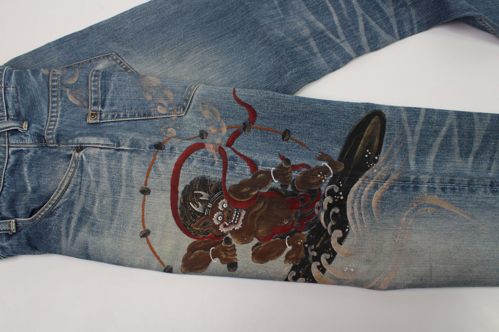 Japanese denim jeans with handpainted design in blue, size 36, 100% cotton, 8/10 condition.