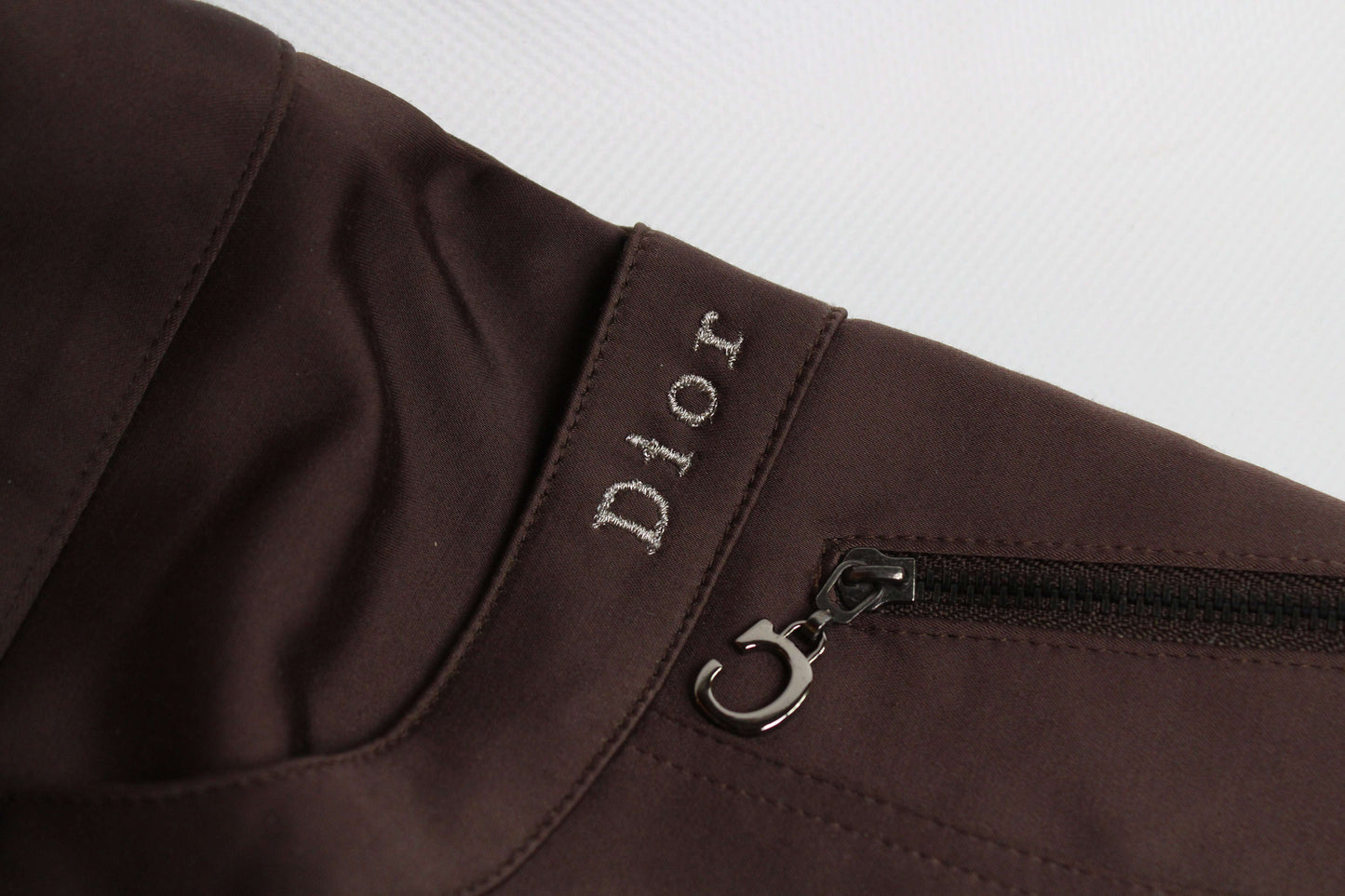 DIOR nylon pants in brown with zipper detail, size 40.